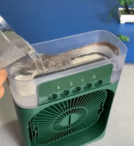 Portable 4-in-1 Mini Air Cooler Fan™ [ With Water Spray ]